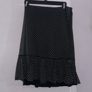 Polka dotted skirt with ruffle hem